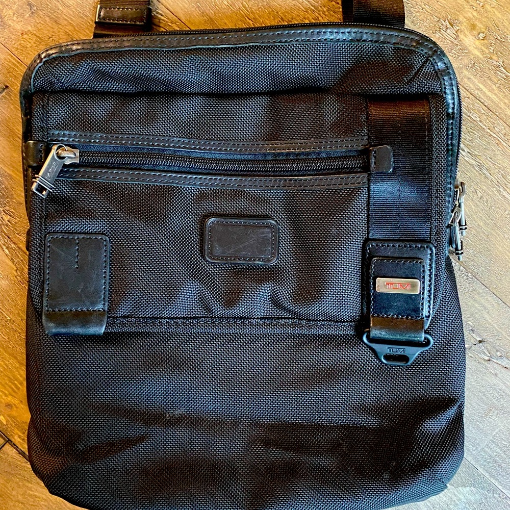 Like New Tumi Crossbody Bag.